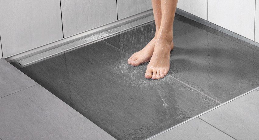 Kalis air lantai di bilik mandi: bahan dan cara meletakkan