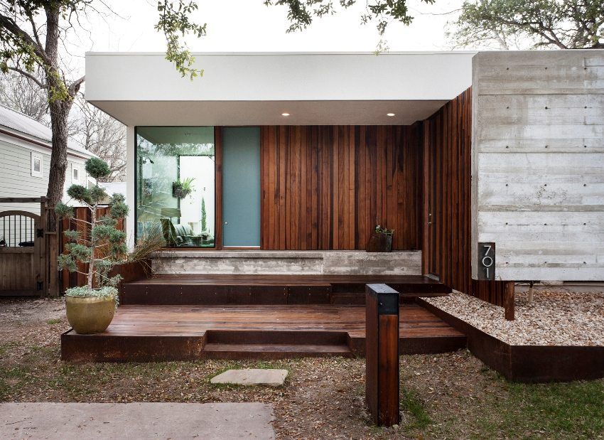 Menghadapi fasad rumah: apa bahan yang lebih baik untuk dipilih